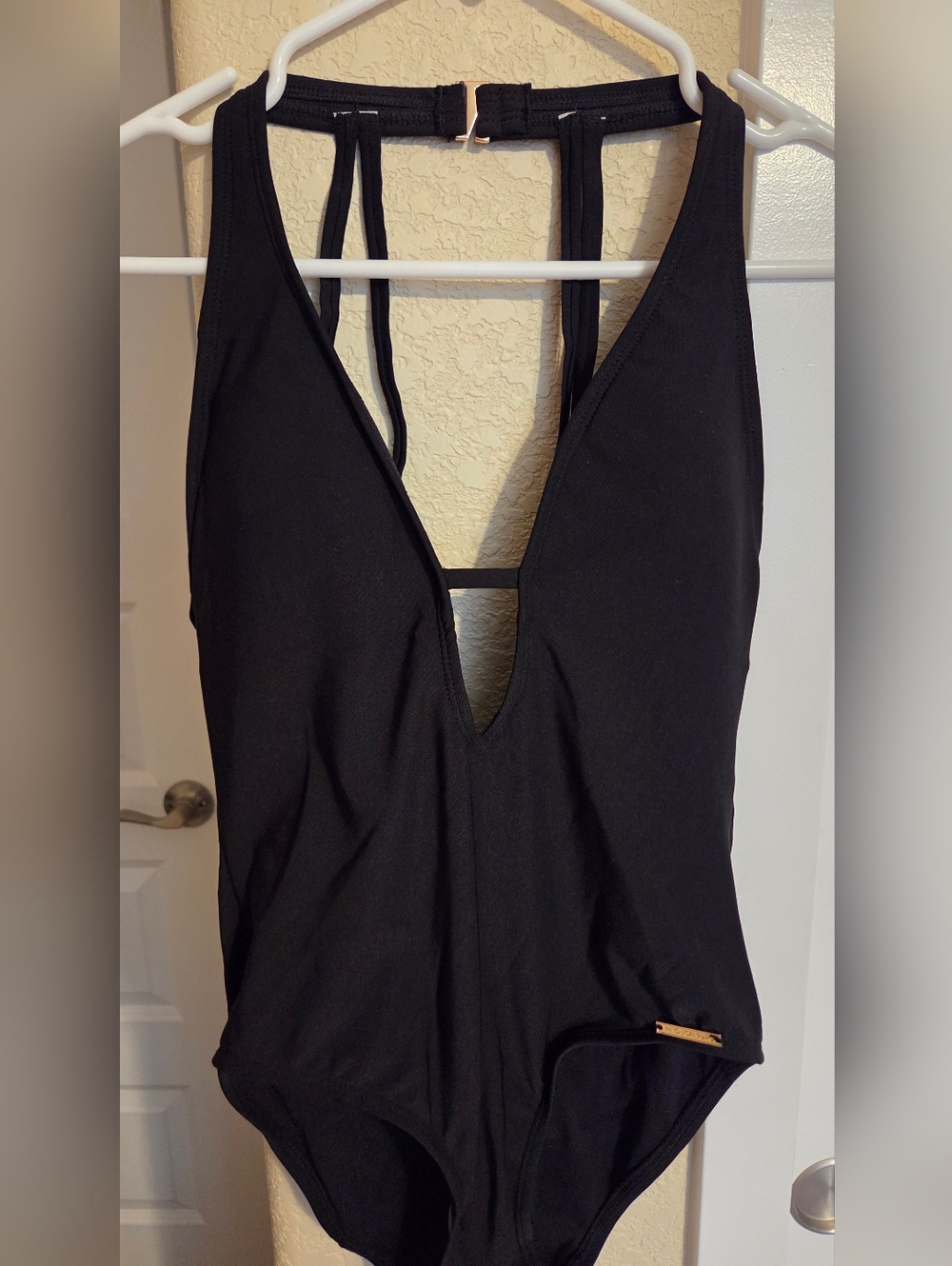 Vince Camuto Black Top with Gold Logo Plaque